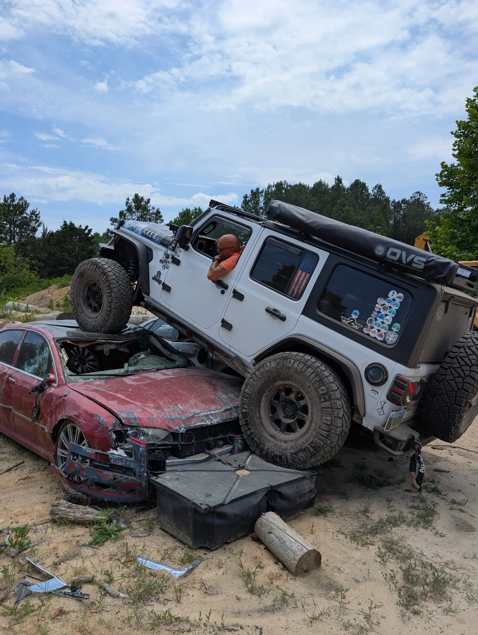 Jeep Wrangler JL climbing an obstacle