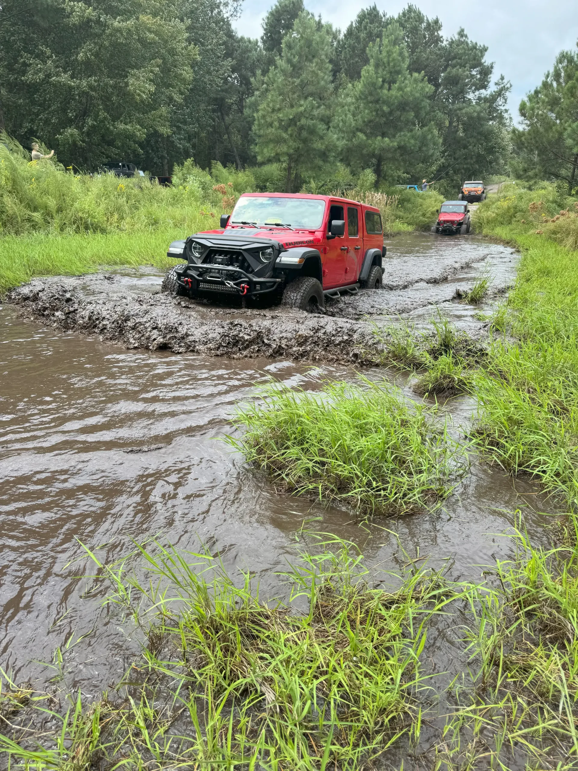 Jeep Gladiator fording water on the trail